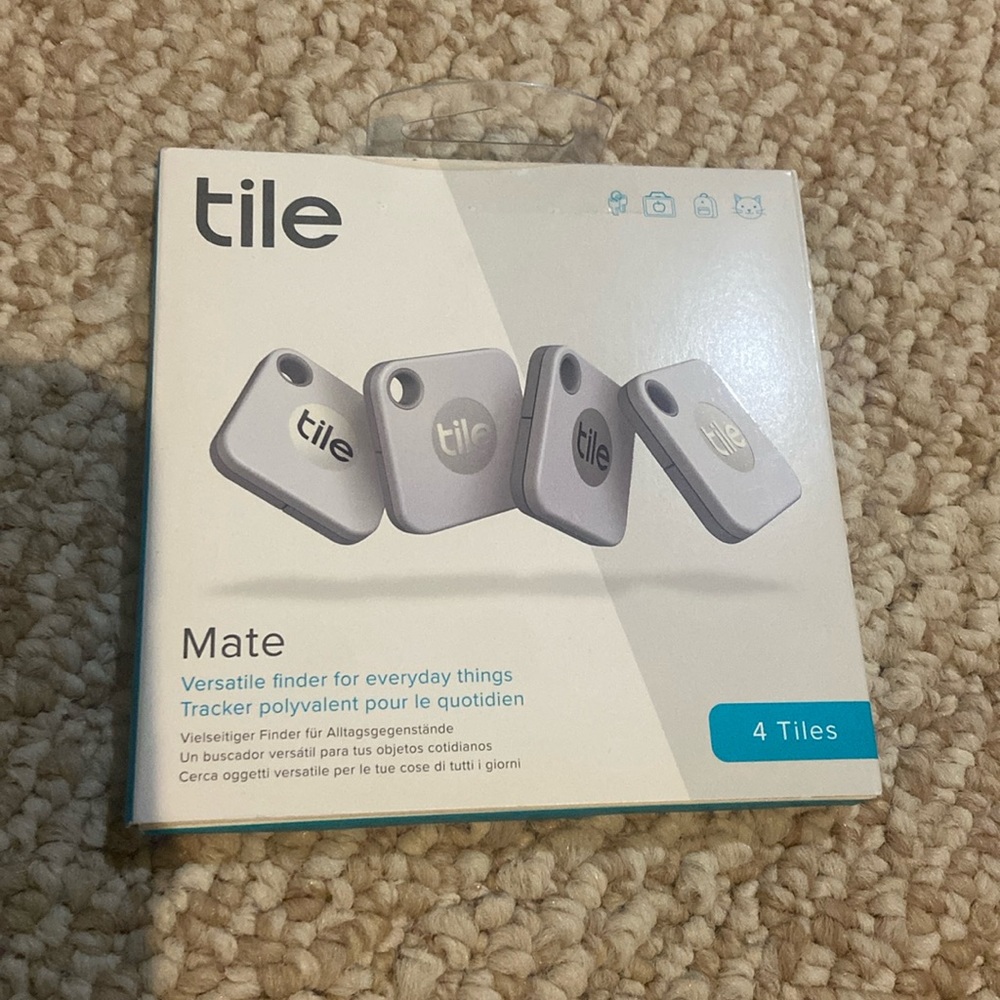 Tile tracking device 4 Pack NEVER OPENED!